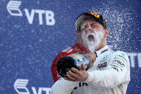 sochi, rusia 30 april pemenang balapan valtteri bottas dari finlandia dan mercedes gp merayakan di podium selama grand prix formula satu rusia pada 30 april 2017 di sochi, russia foto oleh will taylor medhurstgetty images