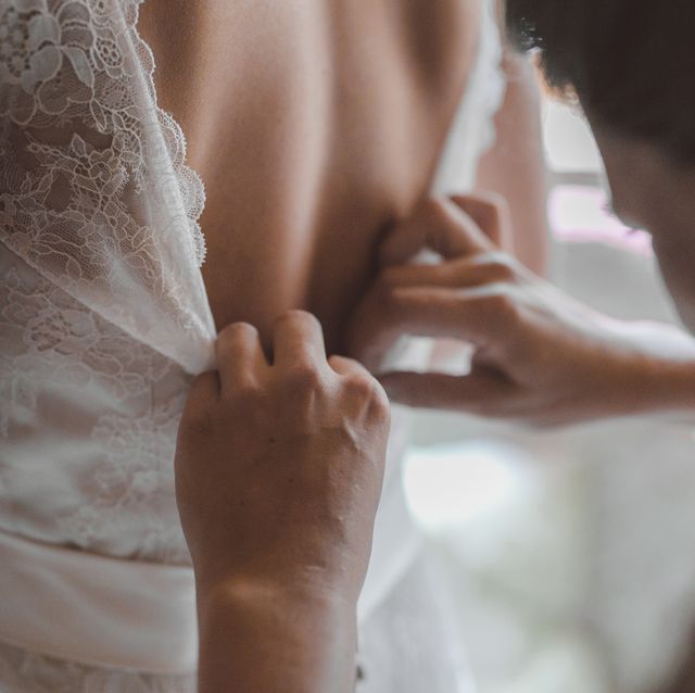 Photograph, Wedding dress, Skin, Hand, Bridal clothing, Gesture, Dress, Bride, Finger, Photography, 
