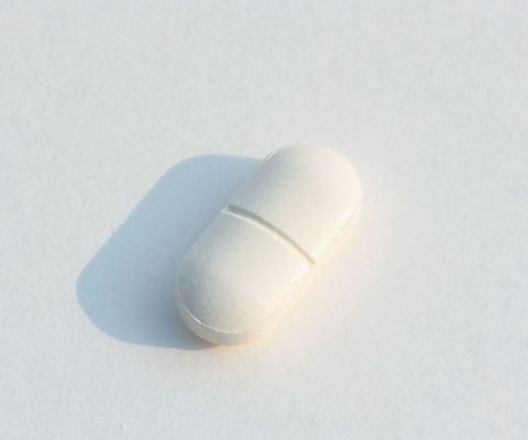 Close-Up Of Pills On White Background