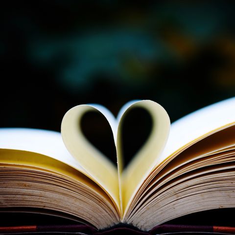 Close-Up Of Heart Shaped Pages Of A Book