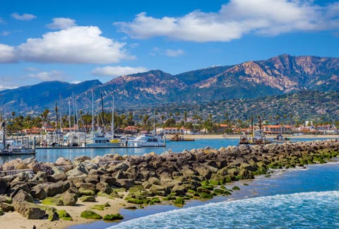 moored recreational boats california marina scene safe harbor southern california recreation santa barbara harbor, mountain range, leisure boats, water reflections, clear sky, still water, breakwater