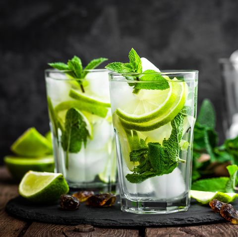 refreshing mint cocktail mojito with rum and lime, cold drink or beverage with ice