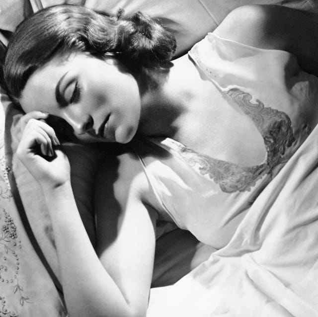 Woman asleep in bed woman asleep in bed