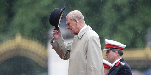 Prince Philip, Duke of Edinburgh raises his hat in his role as Captain General, Royal Marines, makes his final individual public engagement as he attends a parade to mark the finale of the 1664 Global Challenge, on the Buckingham Palace Forecourt on August 2, 2017 in London, England. 