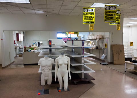 US-RETAIL-MALLS empty shopping racks and mannequins being sold at discount prices are displayed at the jcpenney at the columbia mall on july 24, 2017 in bloomsburg, pennsylvania the jcpenney is having a store liquidation sale and plans to close july 31, 2017 abandoned by the big brands, deserted by the young, the american mall, once temples of the shopping, have become ghost towns, victims of the explosion of online shopping afp photo don emmert to go with afp story by john biers, "deserted, us shopping centers look for a future" photo credit should read don emmertafp via getty images