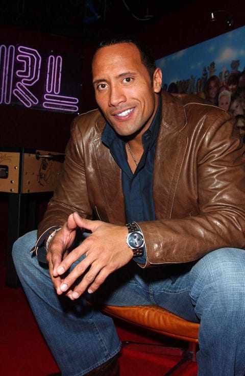 dwayne johnson black shirt jeans