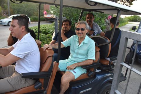 mugla, turkey   august 16 saudi prince al waleed bin talal bin abdulaziz al saud c takes a buggy ride while returning to the hotel at bodrum in mugla province of turkey on august 16, 2017 saudi prince and his family arrived in the resort on august 14 for holiday photo by ali ballianadolu agencygetty images