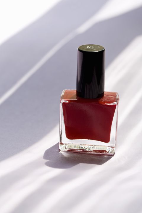 Nail polish, Red, Cosmetics, Glass bottle, Product, Maroon, Nail care, Bottle, Liquid, Material property, 
