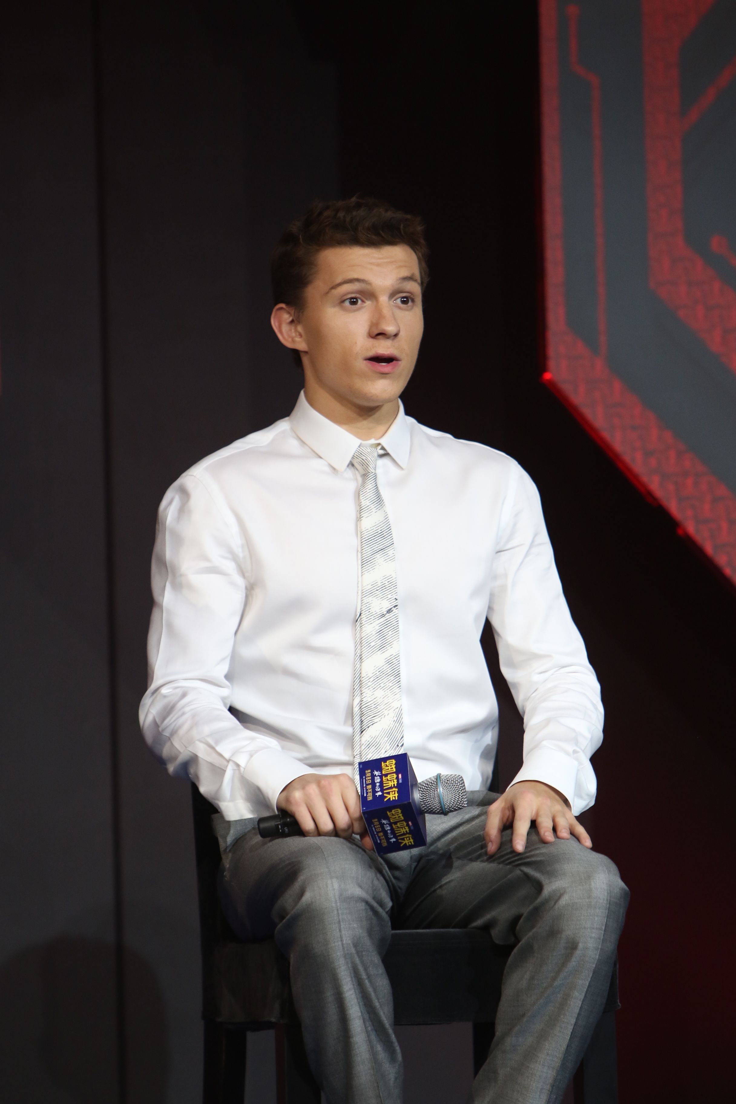 tom holland white shirt