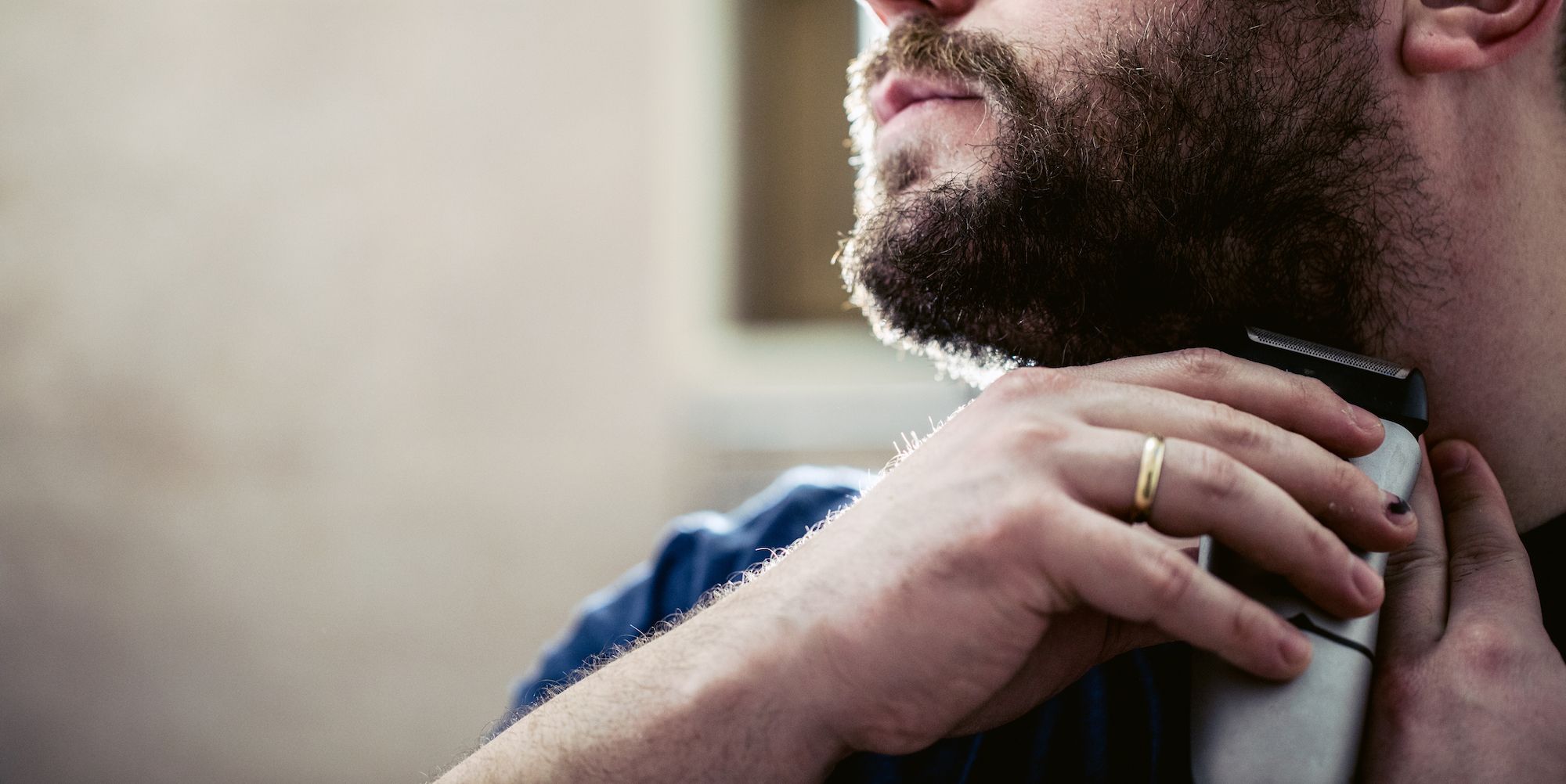 trimming mustache with beard trimmer