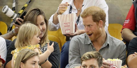 21 adorable photos of Prince Harry with kids just because