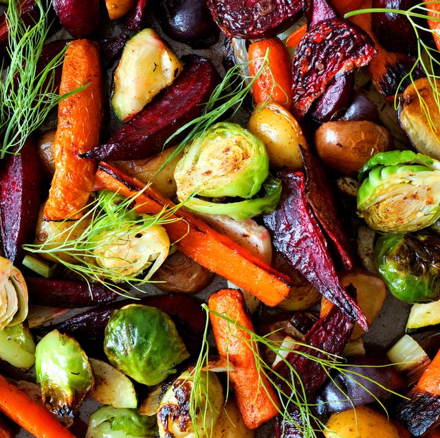 winter vegetables full background of colorful roasted autumn vegetables, above view