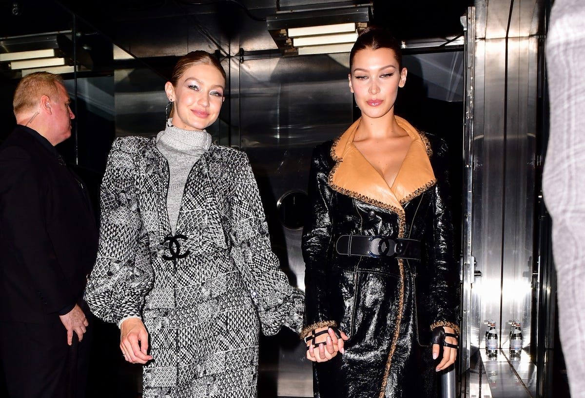 Gigi and Bella Hadid Hold Hands in Matching Chanel