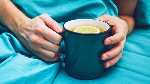 Sick man with hot tea in the bed Sick man with hot tea in the bed