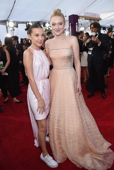 Millie Bobby Brown Wea... Dakota Fanning