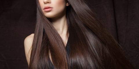 Brunette with bright makeup in studio