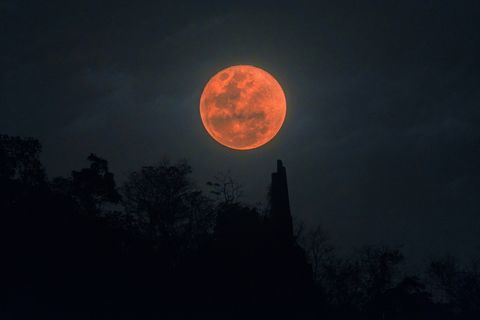 blood moon full lunar eclipse over mountain in thailand, jan 31 2018