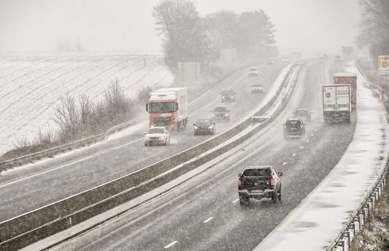 cars driving highway snow cars driving highway snow