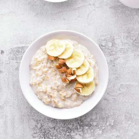 Oats porridge with banana slices and nuts