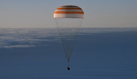 Astronauts cosmonauts return from ISS