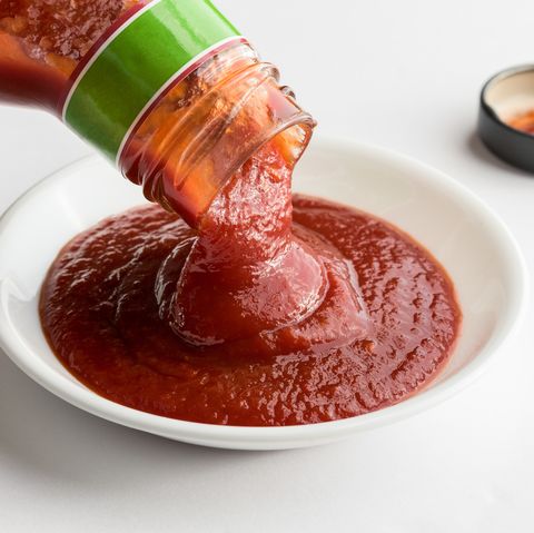 close up of ketchup over white background mens health bbq