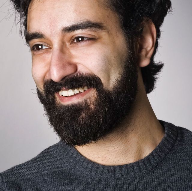 man with beard smiling