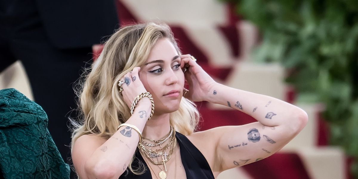 Miley Cyrus S Tattoos Photos And Meaning Of Miley Cyrus Tattoos