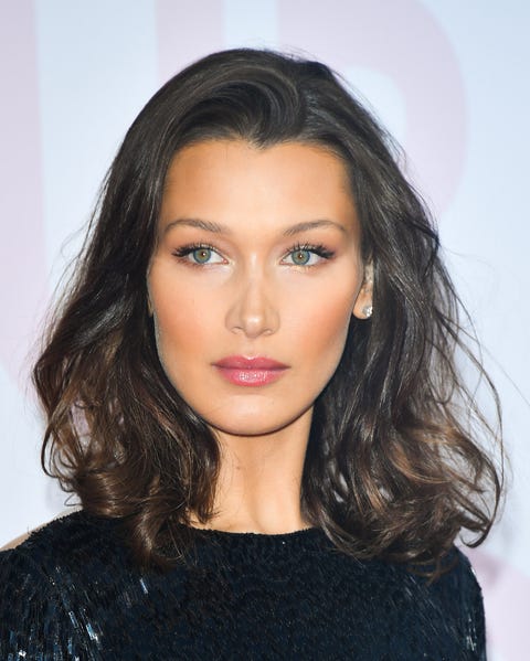 Hair, Clothing, Lip, Beauty, Eyebrow, Hairstyle, Crop top, Shoulder, Black hair, Long hair,