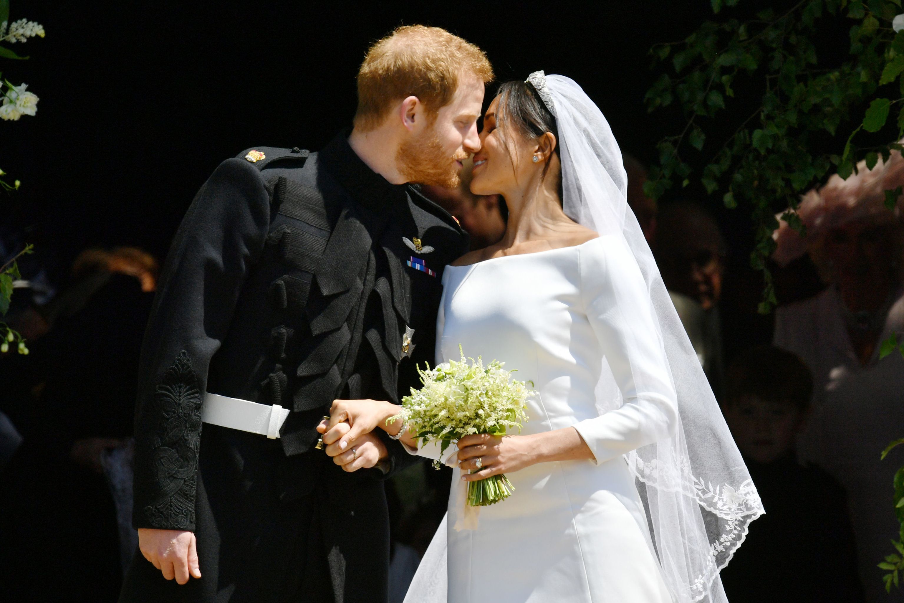 the royal wedding prince harry meghan markle first kiss