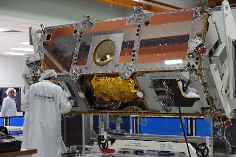 Technicians work on the assembly line of