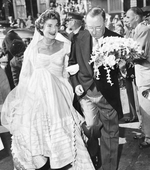 A smiling Jacqueline Bouvier arrives at St. Mary's Church in
