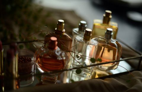 perfume bottles on a tray
