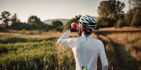 cyclist drinking water