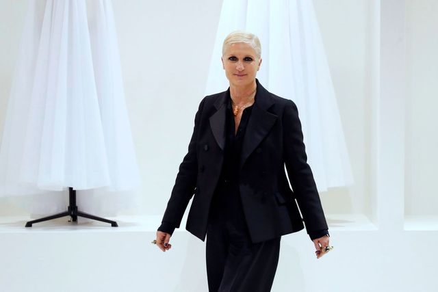 italian fashion designer maria grazia chiuri for christian dior acknowledges the audience at the end of the 2018 2019 fallwinter haute couture collection fashion show by christian dior in paris, on july 2, 2018 photo by francois guillot  afp        photo credit should read francois guillotafp via getty images