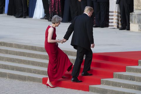 Donald Trump tried held Theresa May's hand again and it's painfully awkward