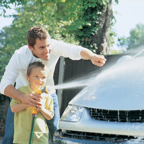 Son Helping His Father to Wash the Car son helping his father to wash the car