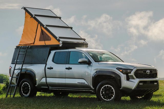 a truck with a camper on top