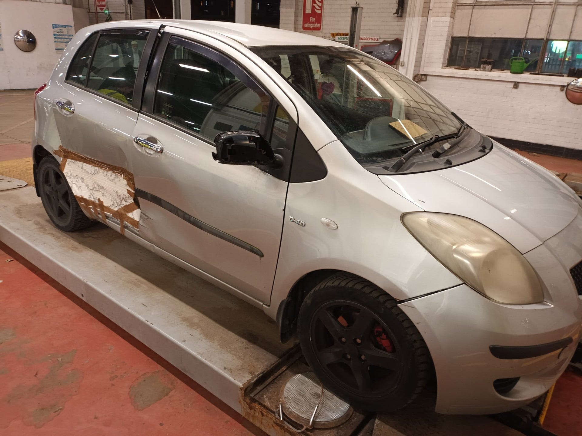 Police Stop and Tow Toyota Yaris Repaired with Wallpaper