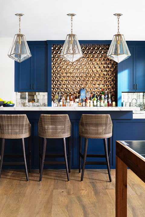 home bar idea, blue cabinets and gold backsplash
