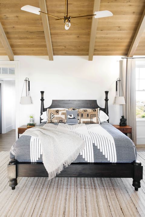 bedroom with wood ceiling designed by cortney bishop design