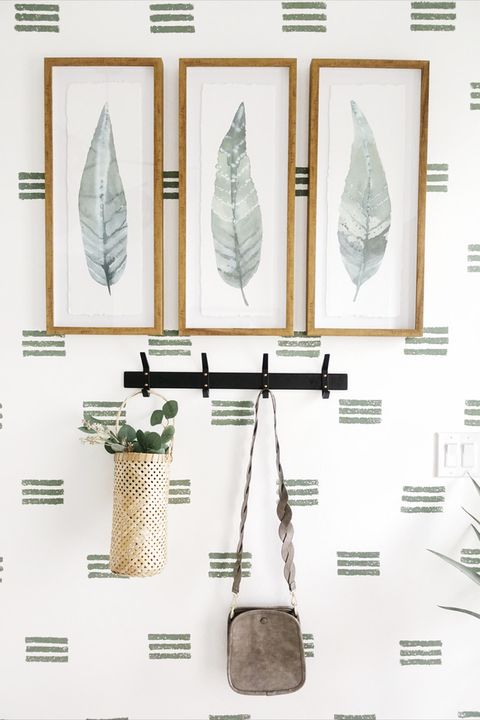 entryway designed by bloggers niña williams and cecilia moye diy wallpaper, painted wall, sponge painting, framed prints