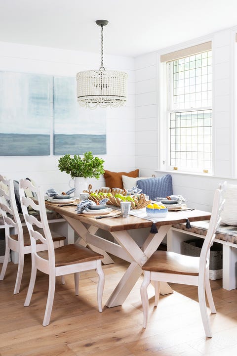 home featuring warm neutrals and soothing blue hues to accent the beautiful architecture of the vintage home interior designer karen b wolf dining room, breakfast nook