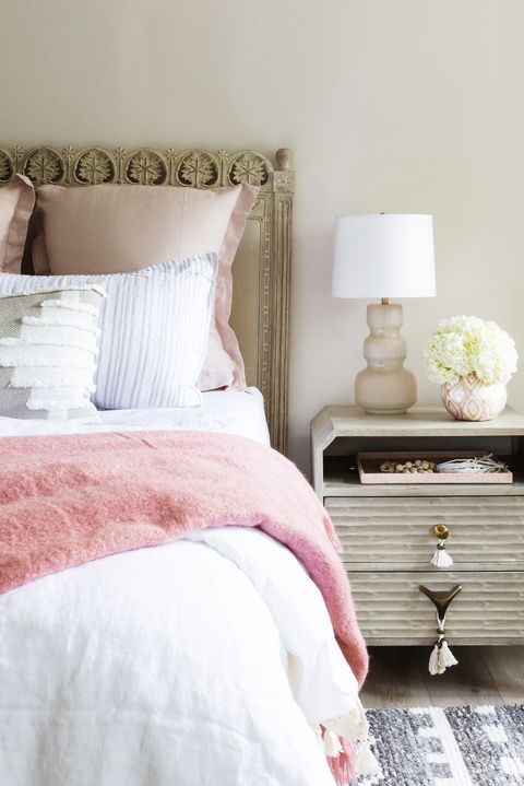 home featuring warm neutrals and soothing blue hues to accent the beautiful architecture of the vintage home interior designer karen b wolf bedroom