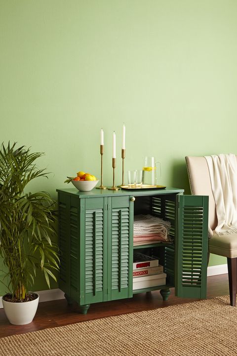 green cabinet made from shutters