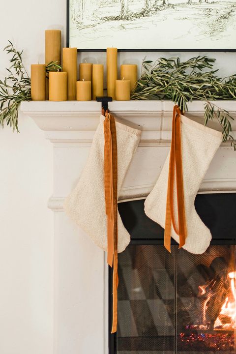mantel with greenery and candles