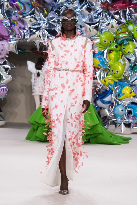 Giambattista Valli fall 2022 couture a white gown with pink feather embellishments