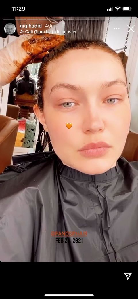 gigi hadid while dying her hair red