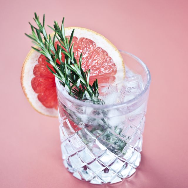 gin and tonic with a slice of pink grapefruit