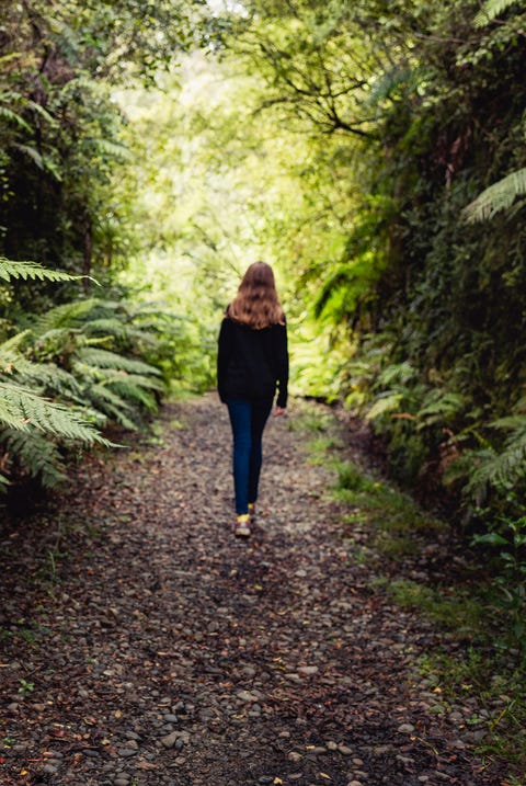 Girl walking in forest girl walking in forest