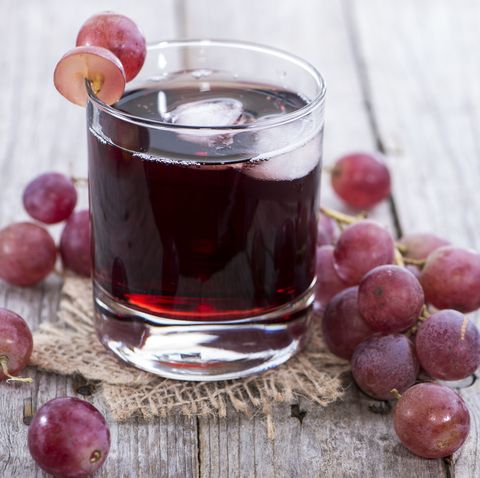 a glass of icy red grape juice